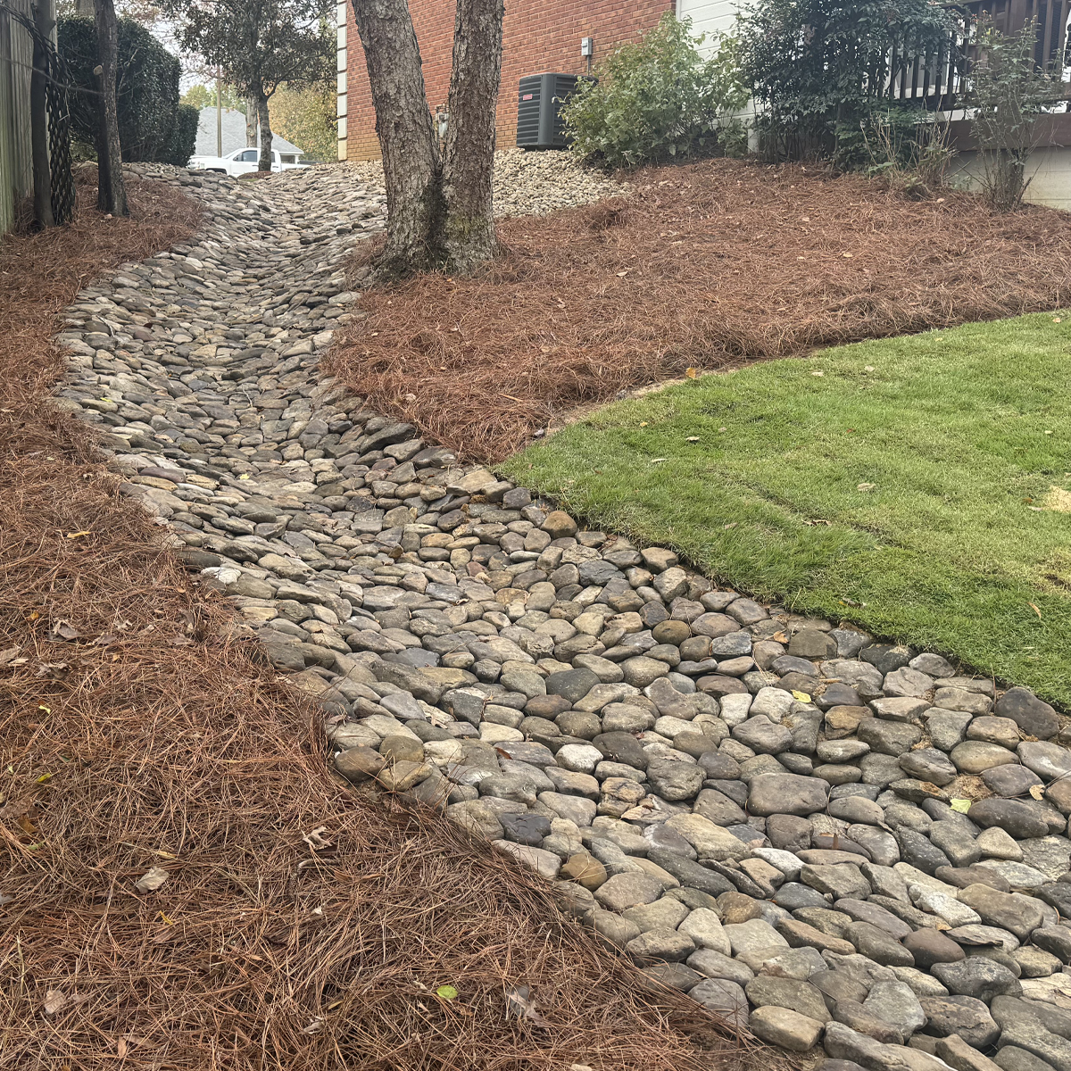_Drainage _ Grading A photo of a dry creek bed installation